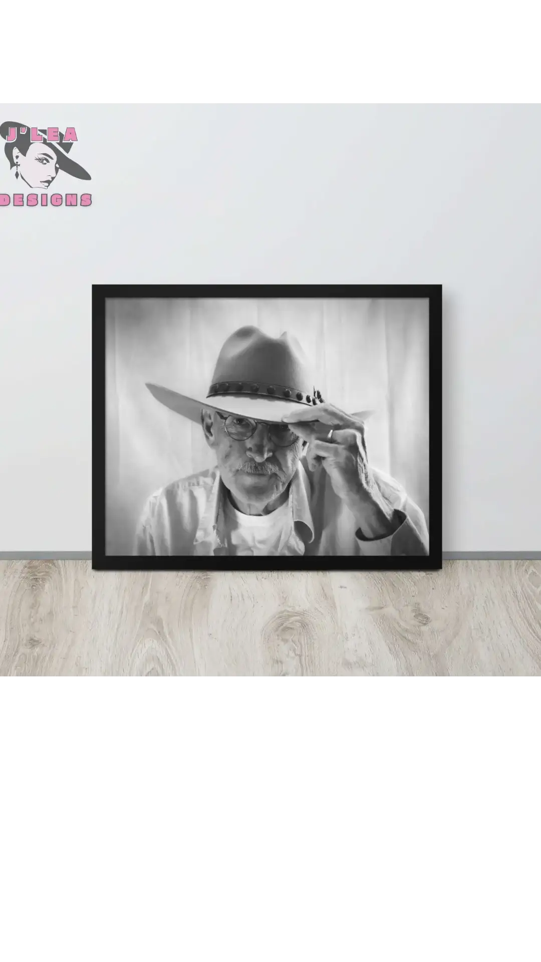 Framed black and white portrait of a man in a cowboy hat