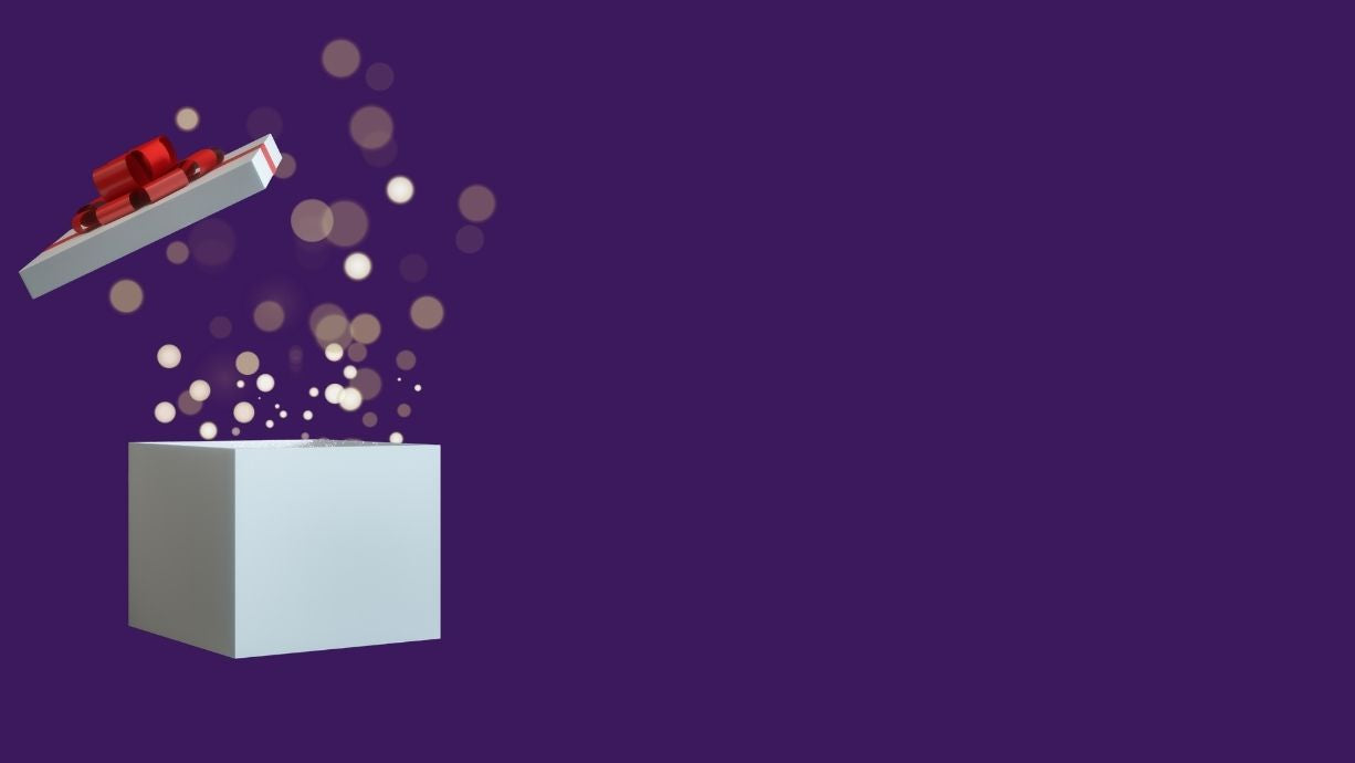 illustration of a gift box with gold bokeh bubbles floating out and the lid floating in air. 