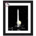 Framed artwork of the Washington Monument against a dark starry sky with a bright moon.